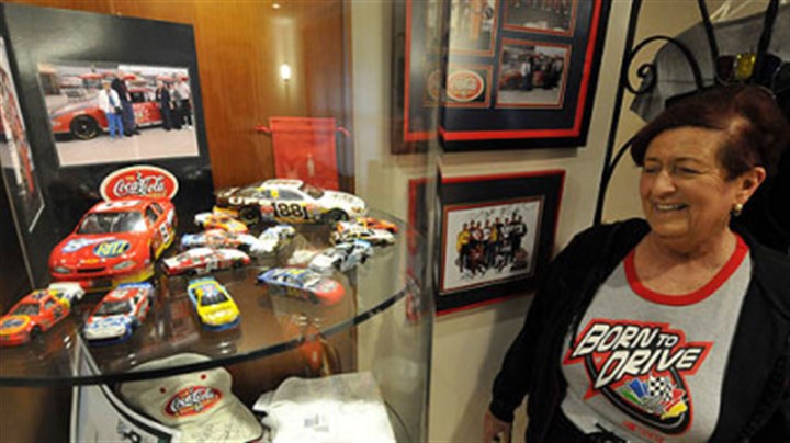Brenda Cohen Brenda Cohen with some of her NASCAR memorabilia at her home in Wilkins.