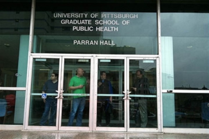 Nearby-buildings.jpg Nearby buildings People watch police activity outside a Univeristy of Pittsburgh Graduate School of Public Healtyh building near the shooting scene at Western Psychiatric Institute and Clinic in Oakland this afternoon.
