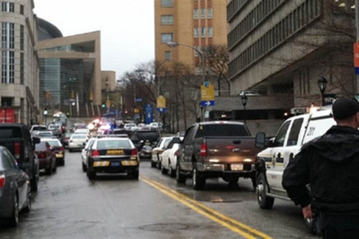 Police-responding-to-the-scene.jpg Police responding to the scene The view up De Soto Street in Oakland where police and emergency personnel responded to the shootings at Western Psychiatric Institute and Clinic this afternoon.