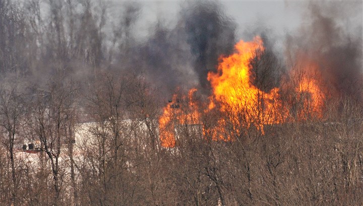20140211lrgasfire06 Gas fire was blasting in Greene County at Chevron well, Feb. 11, 2014. The fires were put out Saturday, Feb. 15.