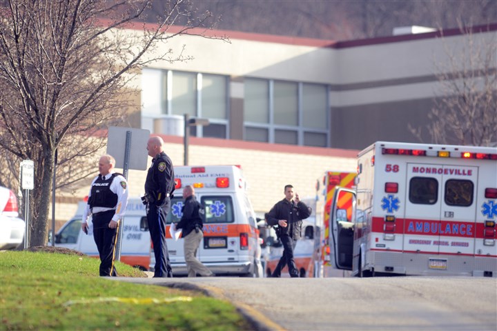 20140409dsStabbingLoc02-3.jpg Stabbings 1 Officials outside of Franklin Regional High School in Murrysville, where multiple people were stabbed this morning.