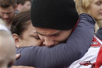  Students comfort each other at a church Friday, Oct. 24, 2014, where students were taken to reunite with parents following a shooting at Marysville Pilchuck High School in Marysville, Wash. 