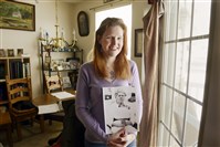 Candice Buchanan, 35, of Castle Shannon holds a 1910  portrait of Emma Staggers, the sister of her great-great-great-great grandmother. The sisters were hospitalized at Dixmont State Hospital in Kilbuck in the early 1900s.