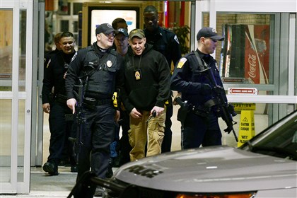 20150207bwShootingLocal01.jpg 20150207bwShootingLocal01 Police leave a secured Monroeville Mall Saturday night after a shooting in the mall. Three people were injured in the incident.
