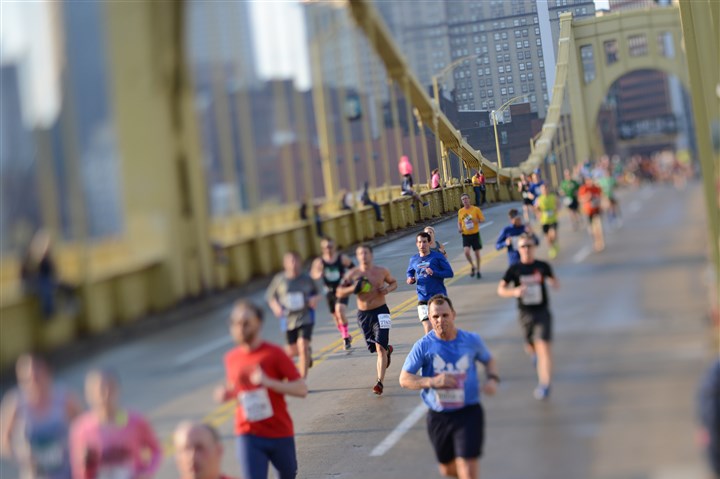 Rain should move out before marathon as temperatures rise up from 50s