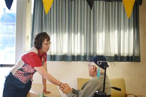  Mary Mason of Cranberry meets WWII veteran John Edward Pellish, 90, originally of Uniontown, Sunday at the Pittsburgh VA. Ms. Mason is a member of the Kushkushkee Trail chapter of the Daughters of the American Revolution (DAR) who hosted a Steelers Pep Rally for veterans in honor of the 125th anniversary of DAR. "We were founded on service and each chapter was encouraged to serve today in honor of our 125th anniversary," said chapter member Sherry Maudie.