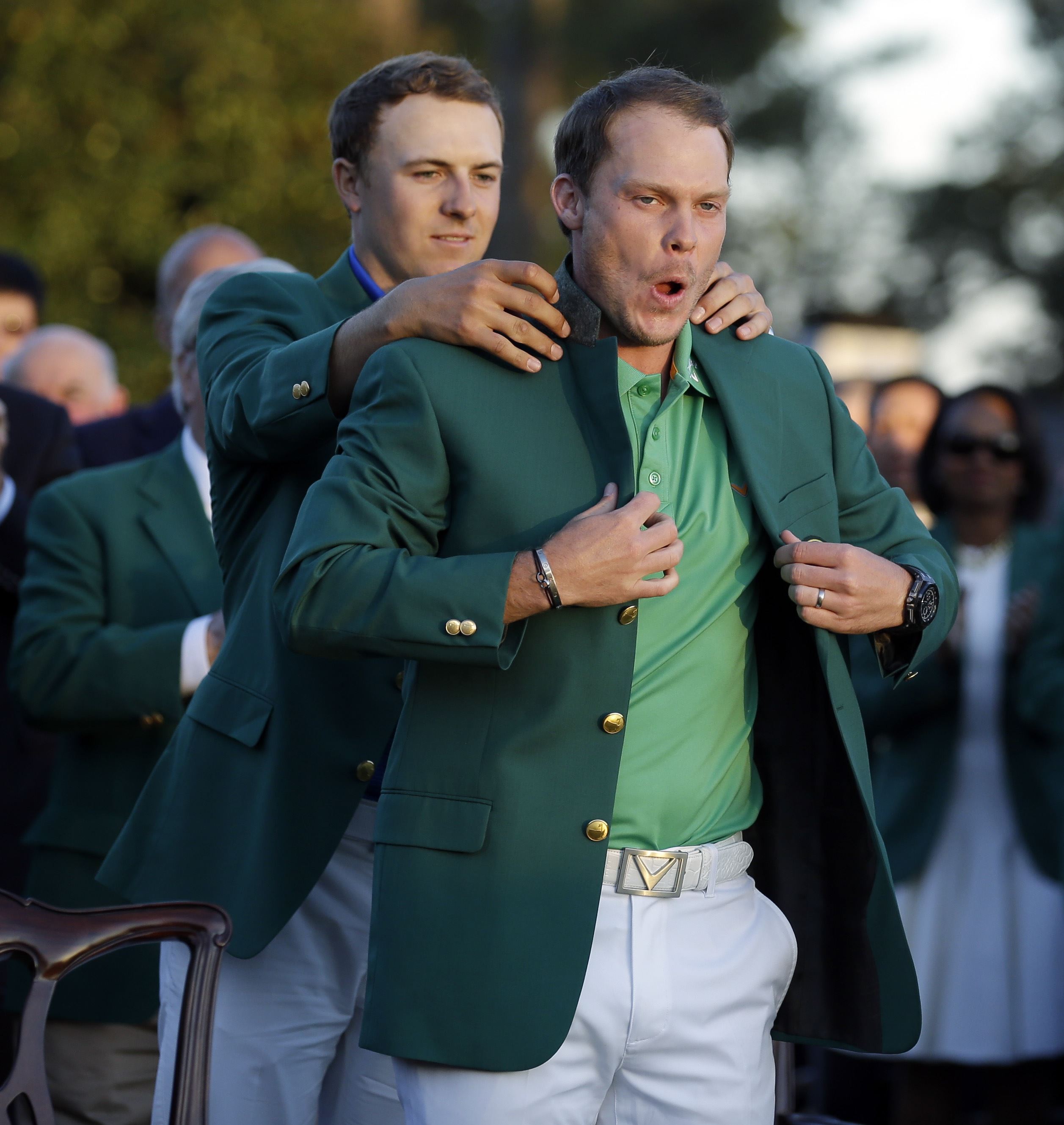 Englishman Willett dons green jacket after Spieth collapses