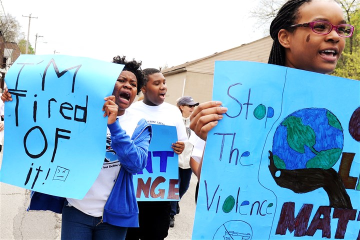 Guns and violence will not define us, pledge eighth-grade activists of Woodland Hills