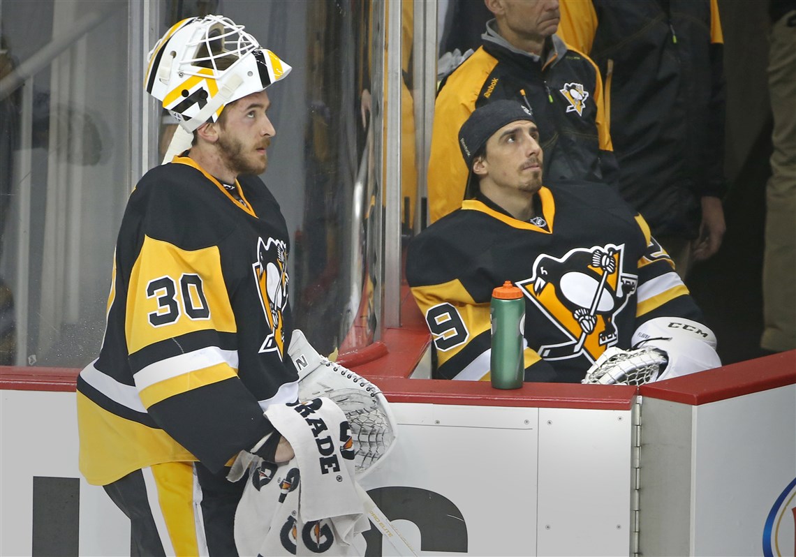 Penguins goalies Matt Murray (left) and Marc-Andre Fleury look at the scoreboard during the first period of Game 4 against the Washington Capitals on May 4 at Consol Energy Center.