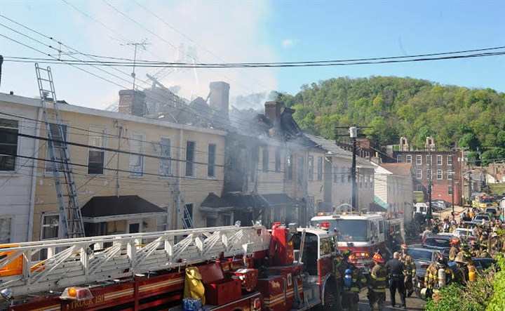 Nine families displaced after fire at Millvale rowhouses
