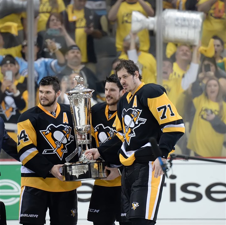20160526pdPenguinsSports13 Penguins left wing Chris Kunitz, left, pose Eastern Conference trophy at the Consol Energy Center Pittsburgh Pa. Sidney Crosby (center) with Evgeni Malkin (right) and 