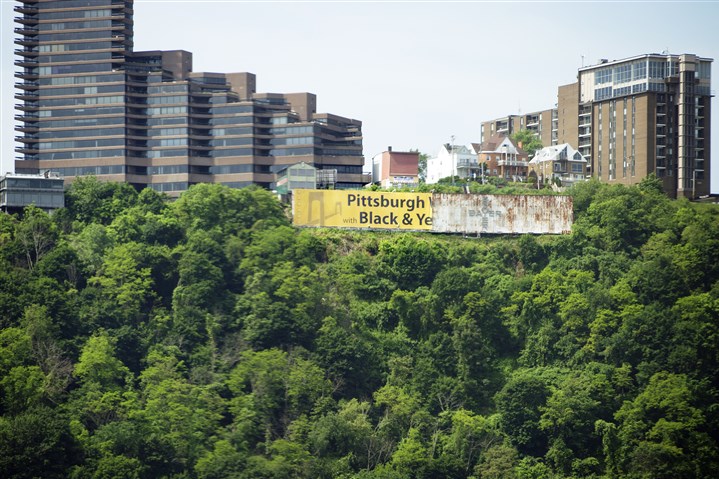 City says Mount Washington sign must go, but Lamar won’t say if it will