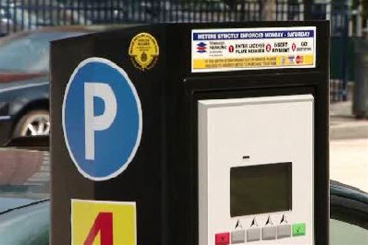 Free parking at some city lots, meters