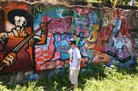 Shane Pilster, graffiti artist, graphic designer, and urban arts coordinator for the Rivers of Steel National Heritage Area. Some photos show the Rivers of Steel logo designed and spray painted by Mr. pilster on the crane wall at the Carrie Furnaces iron mill in Swissvale. Other photos show Pilster in frounr of the crane wall where a number of graffiti panels have been painted, or inside the "power house," one of the sites, along with the crane wall, where graffiti is permitted and encouraged. For national parks series running 6/23 online, 6/26 in Mag