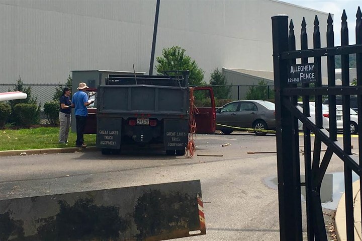 Man drives through security gate at FBI's South Side office