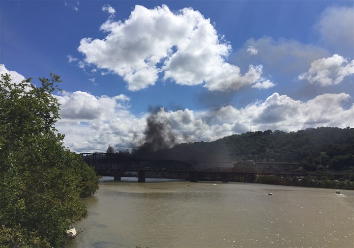 Tarp fire shuts down Liberty Bridge