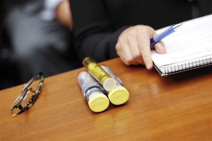 Mylan announces push of low-cost generic EpiPens as its third quarter takes hit