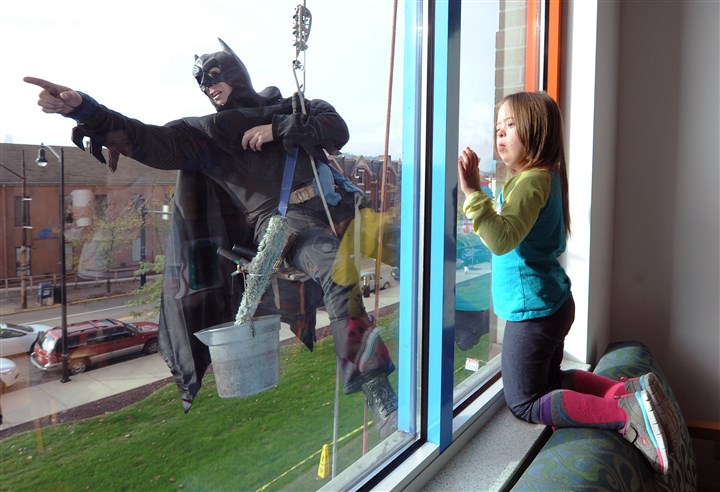 Superheroes show up at Children's Hospital