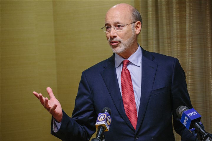 Wolf says merger of four health departments won't bring cuts in service