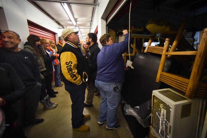 Treasure hunters: For some, auctions of abandoned storage items are just like Christmas