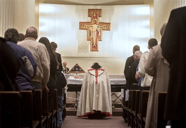 Father Scanlan's legacy: a conservative Catholic citadel on the Ohio RIver