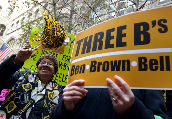 Steelers fans cheer on the black-and-gold Downtown
