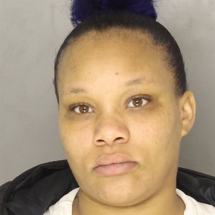 Woman wanted in Crafton Heights killing turns self in