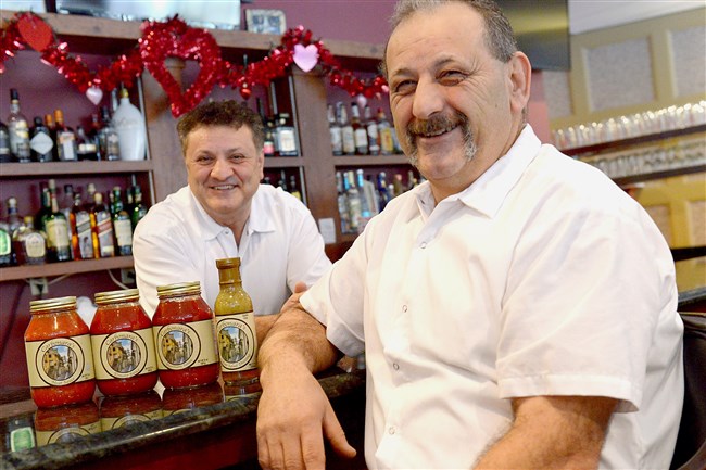  John and Tony Carbonara at the bar in Carbonara's Ristorante, the family restaurant opened 22-years-ago in Mt. Lebanon.