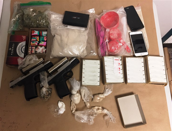Police arrest three men in North Side house where drugs, guns were found