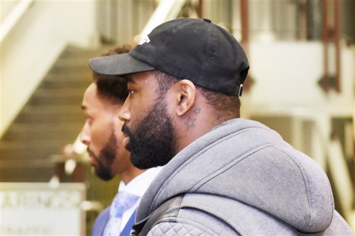 Darrelle Revis turns himself in; charged  in South Side fracas