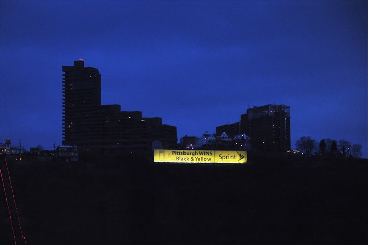 Sprint banner on Mount Washington did not enlarge Bayer sign, judge says