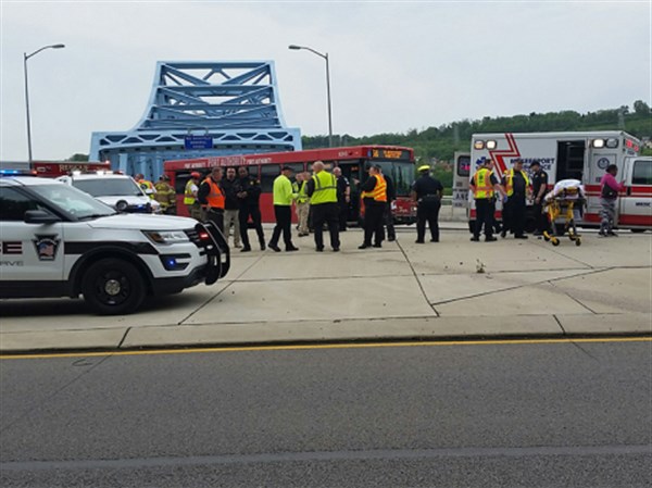 Seven hurt in crash between bus and car on Mansfield Bridge