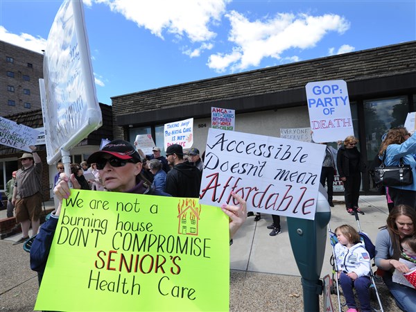 Women's March takes fight to local legislators, calls ACA rollback "oppressive"