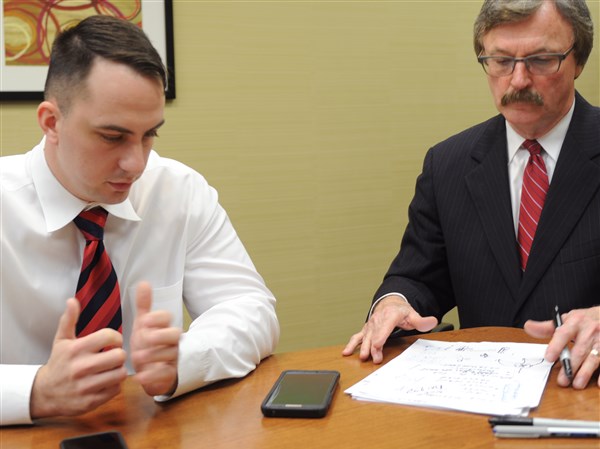 Weirton officer fired for not shooting man sues city