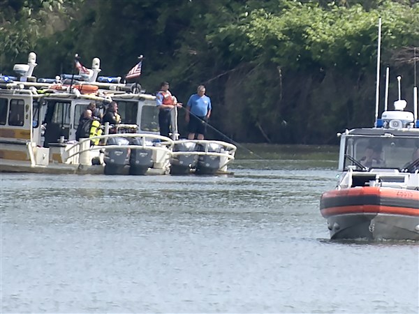 At least 1 dead after SUV goes off bridge into Ohio River