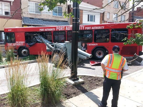 Port Authority bus strikes cannon at Brookline war memorial