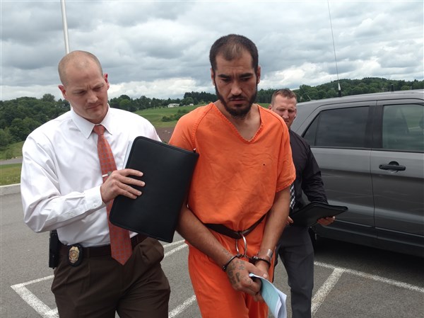 Son charged with his father's brutal murder