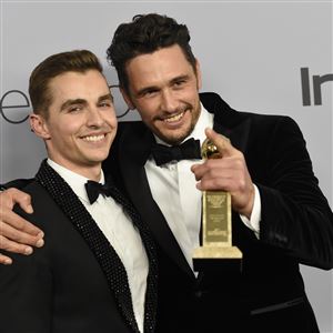FILE - In this Jan. 7, 2018, file photo, Dave Franco, left, poses with James Franco, winner of the award for best performance by an actor in a motion picture - musical or comedy for "The Disaster Artist," at the InStyle and Warner Bros. Golden Globes afterparty in Beverly Hills, Calif. The New York Times has canceled a public event with James Franco days after the Golden Globe winner was accused of sexual misconduct. The TimesTalk event scheduled for Wednesday, Jan. 10, was intended to feature â€œThe Disaster Artistâ€ director and star and his brother and co-star, Dave Franco, discussing the film with a Times reporter. The Times said in a statement that â€œgiven the controversy surrounding recent allegationsâ€ it was canceling the event. (Photo by Chris Pizzello/Invision/AP, File)