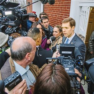 Democratic candidate Conor Lamb talks to a throng of media after voting in the 18th Congressional District special election at the First Church of Christ, Scientist in Mt. Lebanon Tuesday morning.