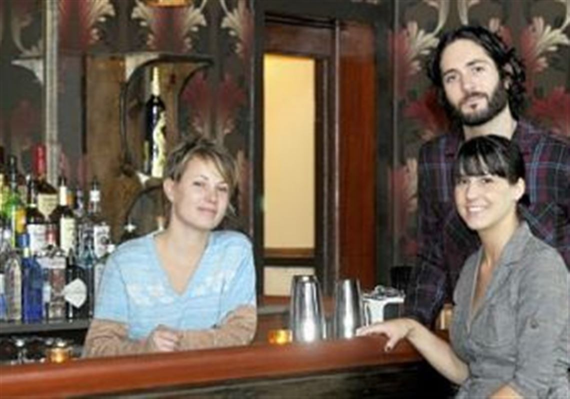 Manager Sarah Fitzgerald and owners Jesse and Derek Burnell at Lawrenceville's Round Corner Cantina.