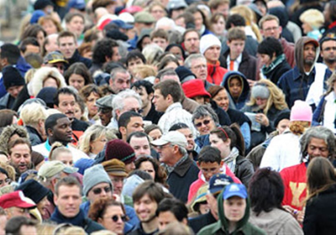 The line for Barack Obama campaign rally wraps around Mellon Arena hours before its start.