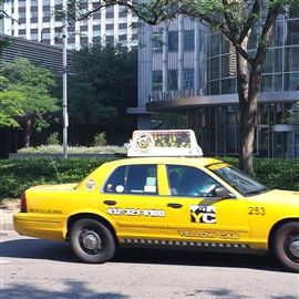 A Yellow Cab travels on Liberty Avenue in Downtown Pittsburgh. 