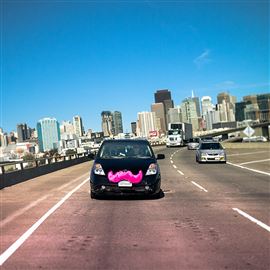 A Lyft car takes to the road. 
