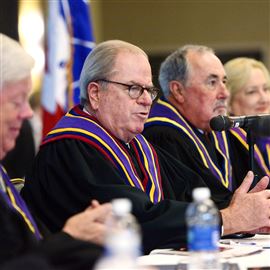 Pennsylvania Supreme Court Chief Justice Ronald D. Castille, center, will meet with Attorney General Kathleen Kane on Friday.