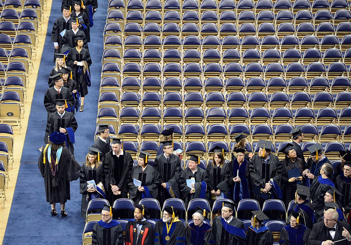 Graduates file into the Peterson Events Center for the 2015 University of Pittsburgh graduation.