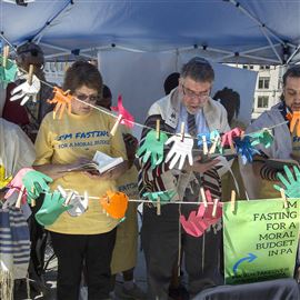 A group of 30 rabbis and other citizens hold a #MoralTakeover fast and public prayer on the steps of the Capitol in Harrisburg to draw attention to and improve public school funding in Pennsylvania.