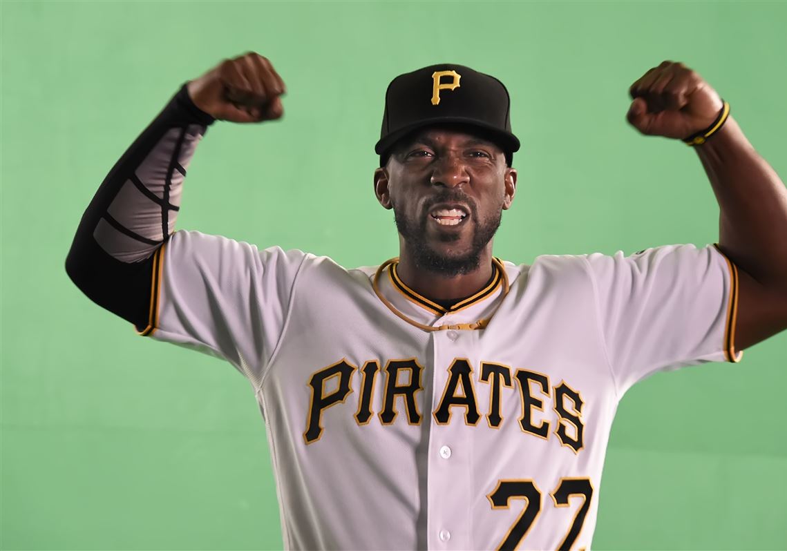 Pirates center fielder Andrew McCutchen pretends to pumps up the fans during his scoreboard shoot Feb. 26 in Bradenton, Fla. 