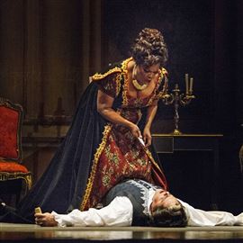 Pittsburgh Opera soloist Leah Crocetto (Floria Tosca) stands over her slain lover, Thiago Arancam (Mario Canaradossi), in a setting at Saint Stanislaus Kostka in the Strip District of Pittsburgh.