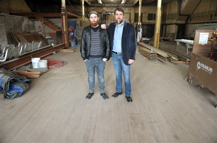 20170221ppHomesteadBrewery2LOC-1 Victor Rodriguez and his brother David stand inside the former Levine Brothers Hardware store in Homestead that they are renovating into a craft brewery and tapas restaurant in Homestead.