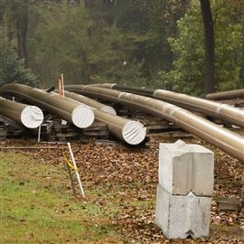 In this Oct. 22, 2019 file photo, pipes lay along a construction site on the Mariner East pipeline in a residential neighborhood in Exton, Pa.
